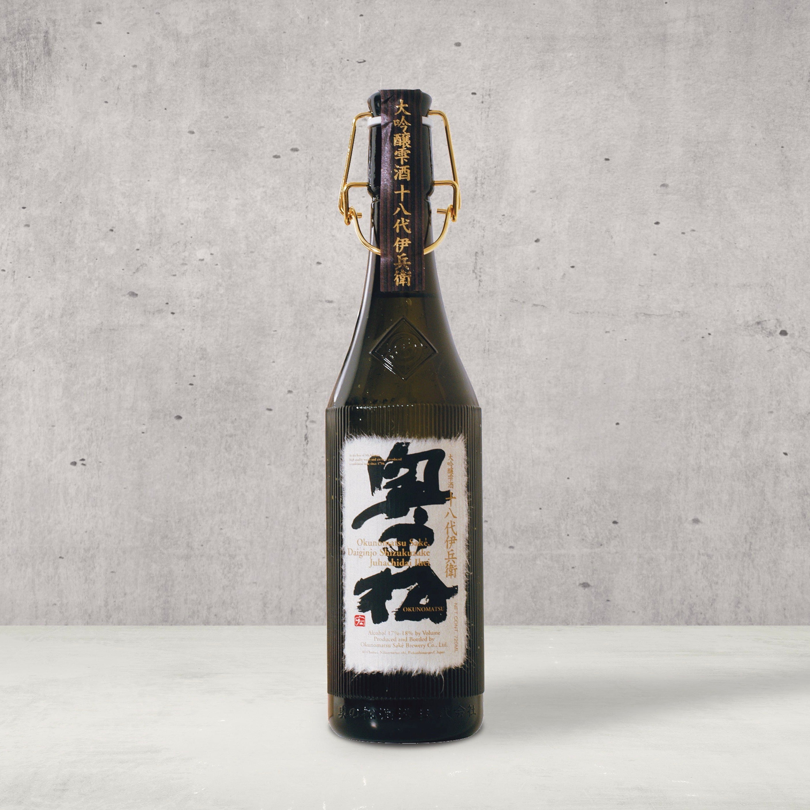 Okunomatsu Juhachidai Ihei Sake. Okunomatsu Sake. Premium High End Luxury Sake. A shizukuzake with overall delicate flavor and fruity lightness that spreads nicely across the tongue in crisp waves, accented by a balanced fragrance. Flagship daiginjo of Okunomatsu, this sake is named for the greatly revered last president who was the 18th generation. 2019 BTI World Wine Championships Gold Medal. Shop Japanese sake drinks online.